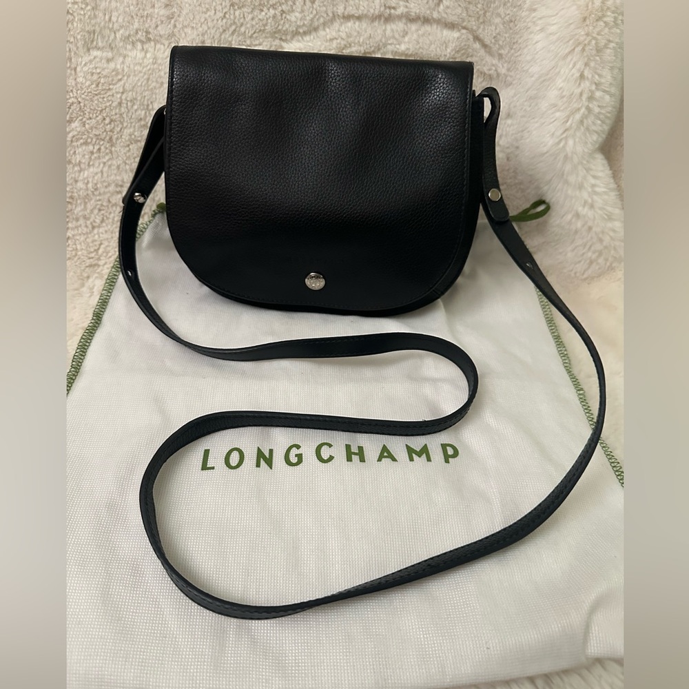 Authentic Longchamp small black leather body bag leather.